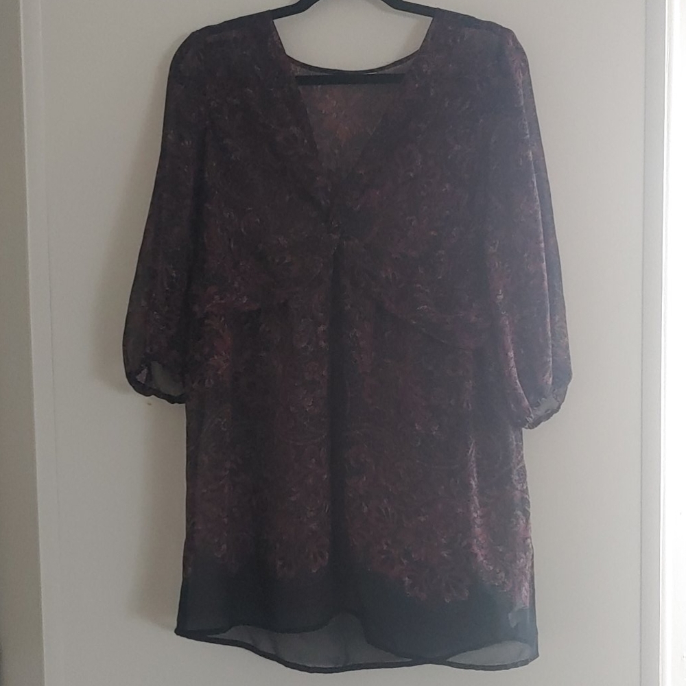 This is a beautiful polyester top.